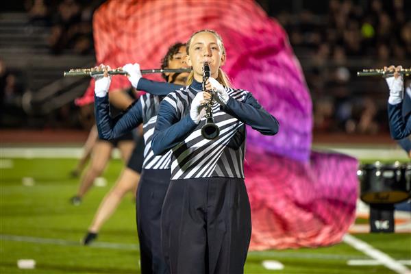 Summit High colorguard members on the field